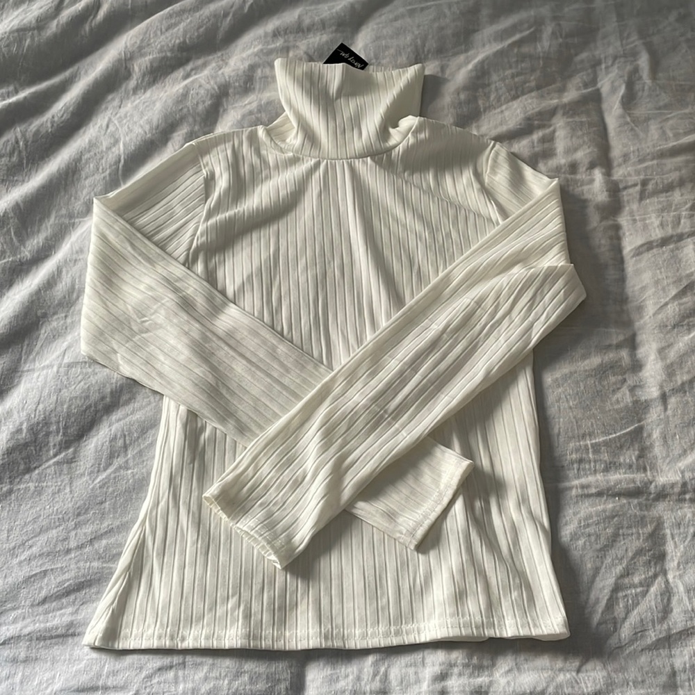 White turtleneck top